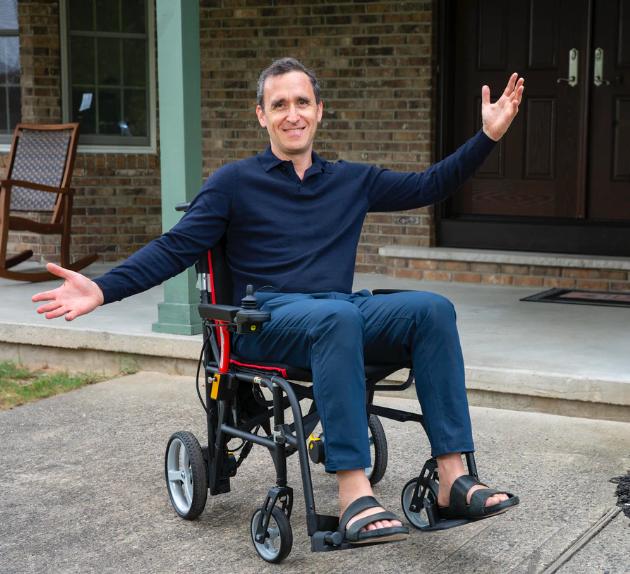 Man Sitting On Featherweight Power Chair